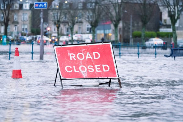 Flooded Road With Road Closed Sign